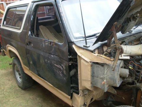1983 Ford Bronco - The door has been emptied, and the wiring is loose inside it. It's ready to come off. For more about Doors, see this album: http://www.supe…