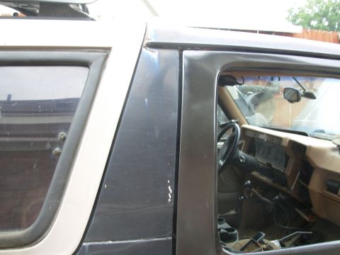 1983 Ford Bronco - The door doesn't fit the opening exactly right, but considering what the body has been through, it's better than I had a right to expect. F…