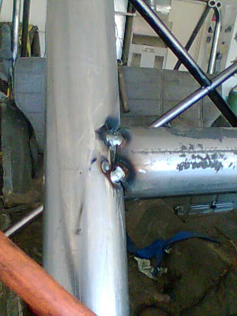 1994 Jeep Cherokee - Detail of a metal tube showing a welded joint, likely part of a larger structure or vehicle component.