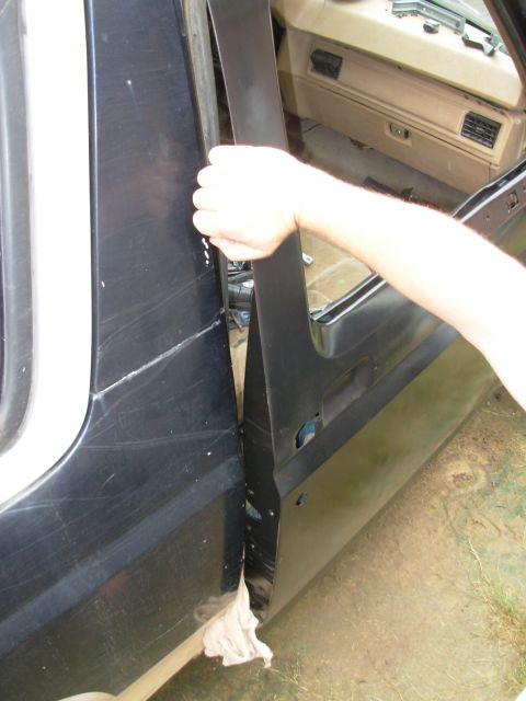 1983 Ford Bronco - Check the lower rear next. Use a towel to hold the door out while pushing the top in to twist the rear edge of the door into alignment with…