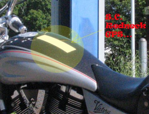 2006 Victory Kingpin - A close-up of a motorcycle's fuel tank shows a yellow tape marking and text overlay.