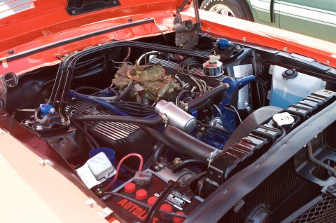1968 Shelby GT500 - Close-up view of a car's engine bay, showing the V8 engine and its components.