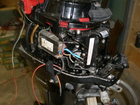 2007 Ford Bronco - This is a close-up view of an outboard motor, showing its internal wiring and components.