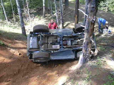 1988 Ford Bronco - This 1988 Ford Bronco has rolled over in the woods, showing its undercarriage.