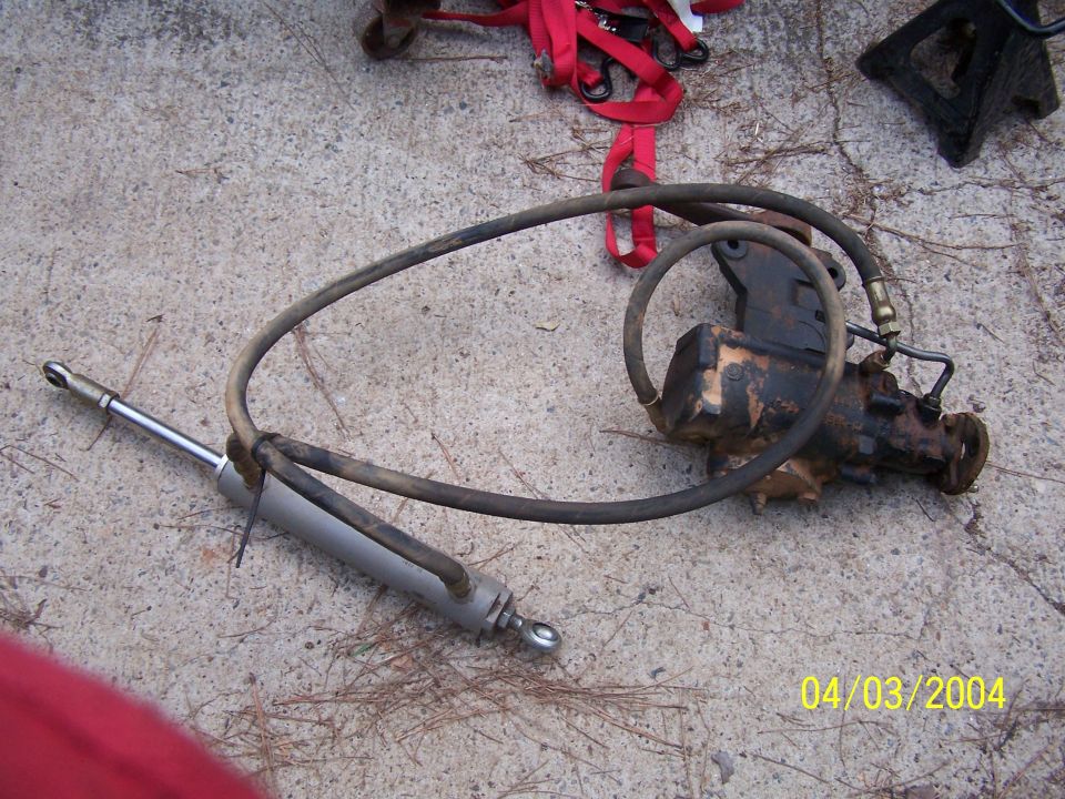 Power steering gearbox and cylinder assembly on concrete