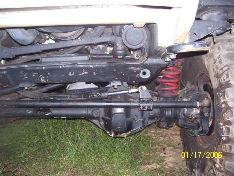 1978 Ford Bronco - Undercarriage view of a 1978 Ford Bronco, showing suspension and steering components.