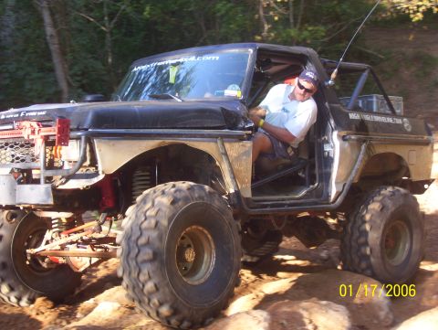 1978 Ford Bronco - Modified 1978 Ford Bronco with a driver, equipped for extreme off-road use.