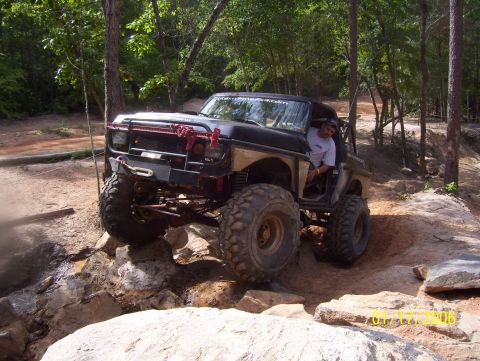 1978 Ford Bronco - This modified 1978 Ford Bronco navigates a challenging rocky terrain during an off-road excursion.