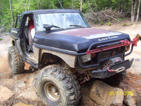1978 Ford Bronco - This heavily modified 1978 Ford Bronco navigates a rocky, off-road trail.