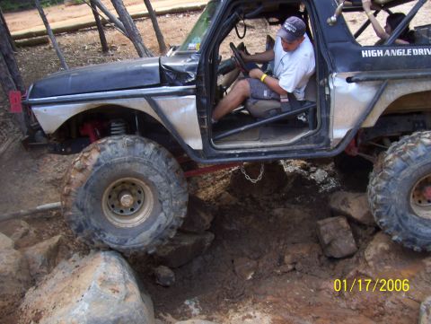 1978 Ford Bronco - Modified 1978 Ford Bronco tackling a challenging rocky trail.