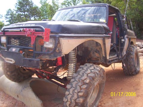 1978 Ford Bronco - This heavily modified off-road vehicle is equipped for extreme terrain, oversized tires and a prominent Hi-Lift jack.