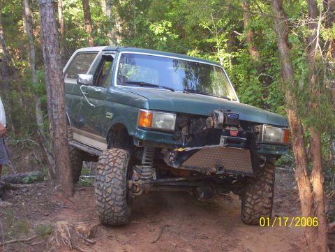 1978 Ford Bronco - This modified Ford Bronco navigates a wooded trail with its front end angled towards the camera.