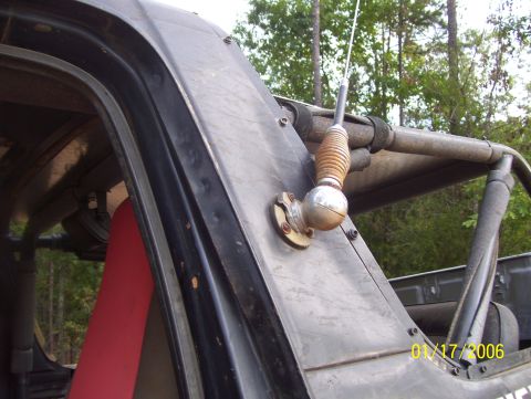 1978 Ford Bronco - Close-up view of an antenna mount on the roll cage of a dark-colored vehicle, possibly a 1978 Ford Bronco. The date "01/17/2006" is visible…