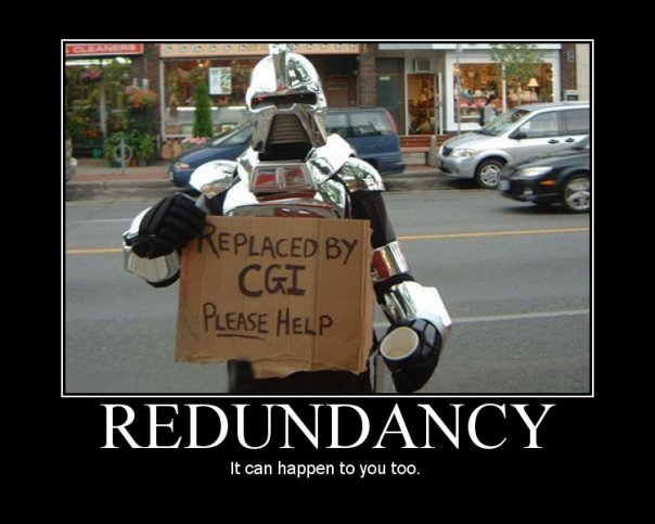 Robot costume holding sign that says "Replaced by CGI Please Help", with "Redundancy" text below.