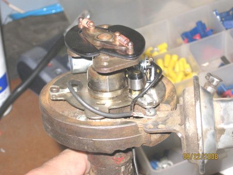 1961 International Scout 800 - A close-up view of a vehicle's distributor, showing the points and condenser, with a date stamp of 09/22/2008 visible.