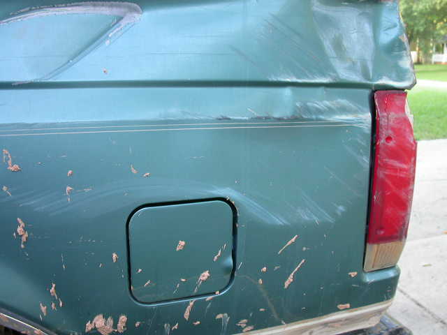 1990 Ford Bronco rear quarter panel with gas cap and taillight