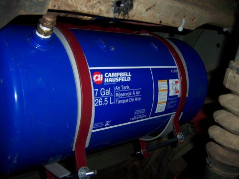 1991 Ford Bronco - A Campbell Hausfeld air tank is visible, mounted beneath a vehicle's chassis.
