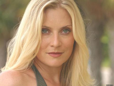 Woman with blonde hair and blue eyes
