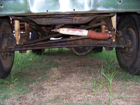 1979 Ford Bronco - Undercarriage view of a 1979 Ford Bronco, showing the steering and suspension components.