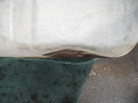 1990 Ford Bronco - Detail of corroded metal and textured surface, with a website watermark visible.