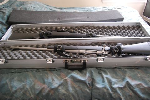 1991 Ford Bronco - Two rifles are stored in a hard-sided case with foam padding.