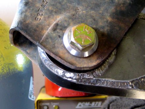 1996 Ford Bronco - A close-up view of a welded metal part, likely from a vehicle's suspension system.