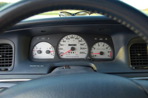 1985 Mercury Grand Marquis - Interior view of a car's dashboard, showing the speedometer and other gauges.