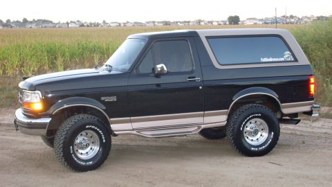 1996 Ford Bronco - This 1996 Ford Bronco is presented in a two-tone black and tan color scheme, aftermarket wheels and tires.
