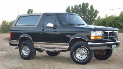1996 Ford Bronco - This 1996 Ford Bronco is shown in a three-quarter front view, parked outdoors.