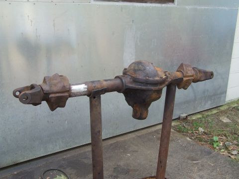1967 Ford Bronco - Rear axle assembly, likely from an older truck or SUV, undergoing restoration or preparation.