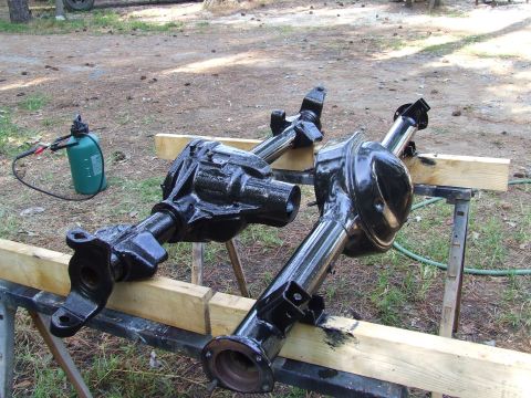 1967 Ford Bronco - Differential axles are shown on sawhorses, possibly undergoing restoration or maintenance.