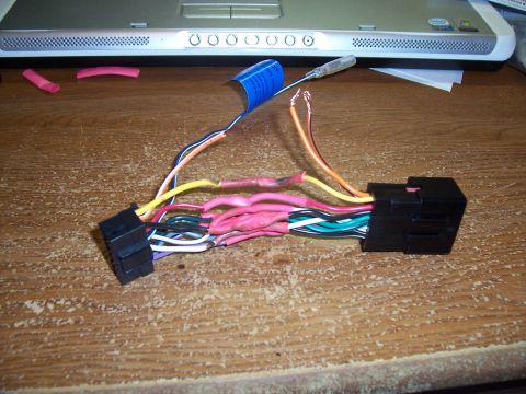 2003 Ford Ranger - This is a wiring harness for a car stereo, with many wires connected using heat shrink tubing.