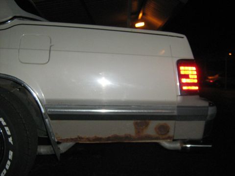 1988 Mercury Grand Marquis - Rust is visible on the lower rear quarter panel of this 1988 Mercury Grand Marquis.