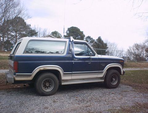 1986 Ford Bronco - This 1986 Ford Bronco is seen from the side, a two-tone blue and white paint scheme.