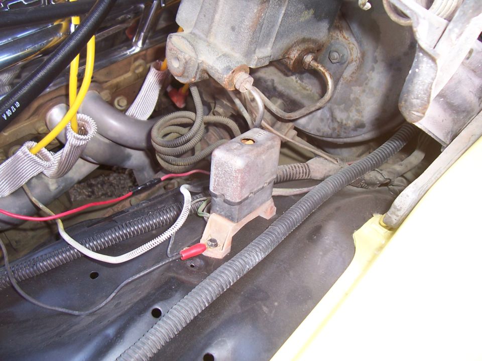 Photo of engine bay wiring, relay and harness components