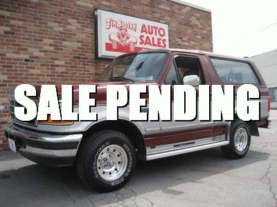1996 Ford Bronco - This Ford Bronco is parked outside an auto sales lot, with a 'SALE PENDING' banner across the image.