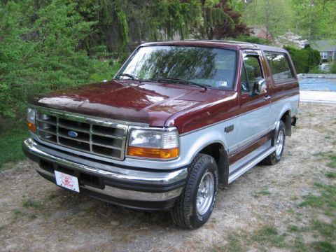 1996 Ford Bronco - This 1996 Ford Bronco features a two-tone paint scheme and a prominent grille.