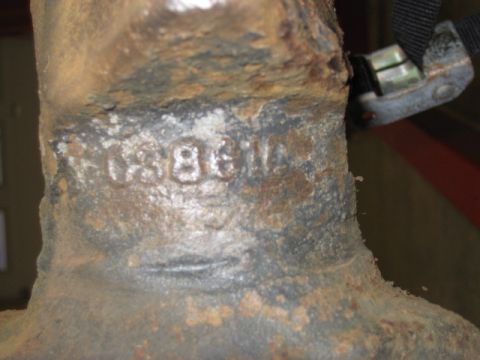 1996 Ford Bronco - Stamped numbers 038614 are visible on a corroded metal component.