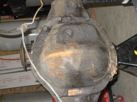 1996 Ford Bronco - Close-up of a rusty differential housing, likely from an older vehicle.