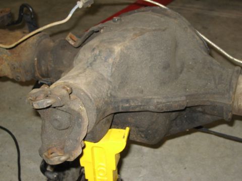 1996 Ford Bronco - This is a close-up view of a vehicle's rear axle differential, showing the driveshaft connection.