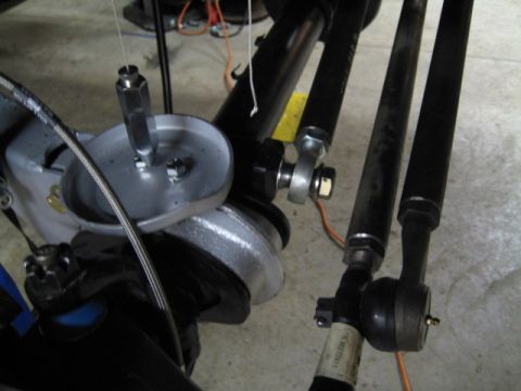 1996 Ford Bronco - Detail view of aftermarket suspension parts, likely for an off-road vehicle modification.