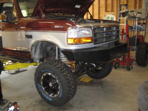 1996 Ford Bronco - This 1996 Ford Bronco is shown with its hood up, lifted suspension, and a custom front bumper.