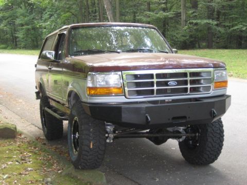 1996 Ford Bronco - This 1996 Ford Bronco features a custom front bumper and aggressive off-road tires.