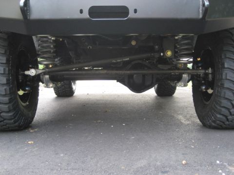 1996 Ford Bronco - Front axle and steering components visible on a modified SUV.