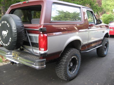 1996 Ford Bronco - This lifted Ford Bronco is shown from the rear, a spare tire mount and a license plate.