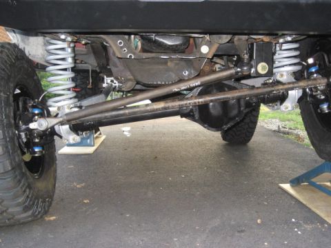 1996 Ford Bronco - Modified front axle and suspension components are visible on a vehicle.