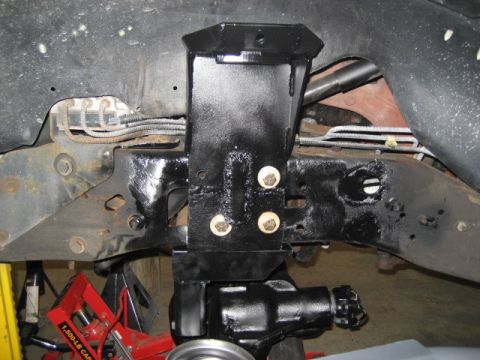 1996 Ford Bronco - Undercarriage view shows suspension modifications and frame components.