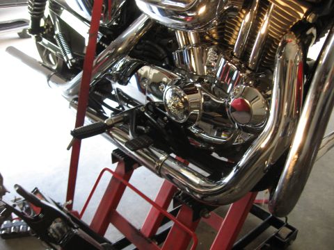 2004 Harley-Davidson Sportster Custom - Close-up of a 2004 Harley-Davidson Sportster Custom engine and exhaust system.