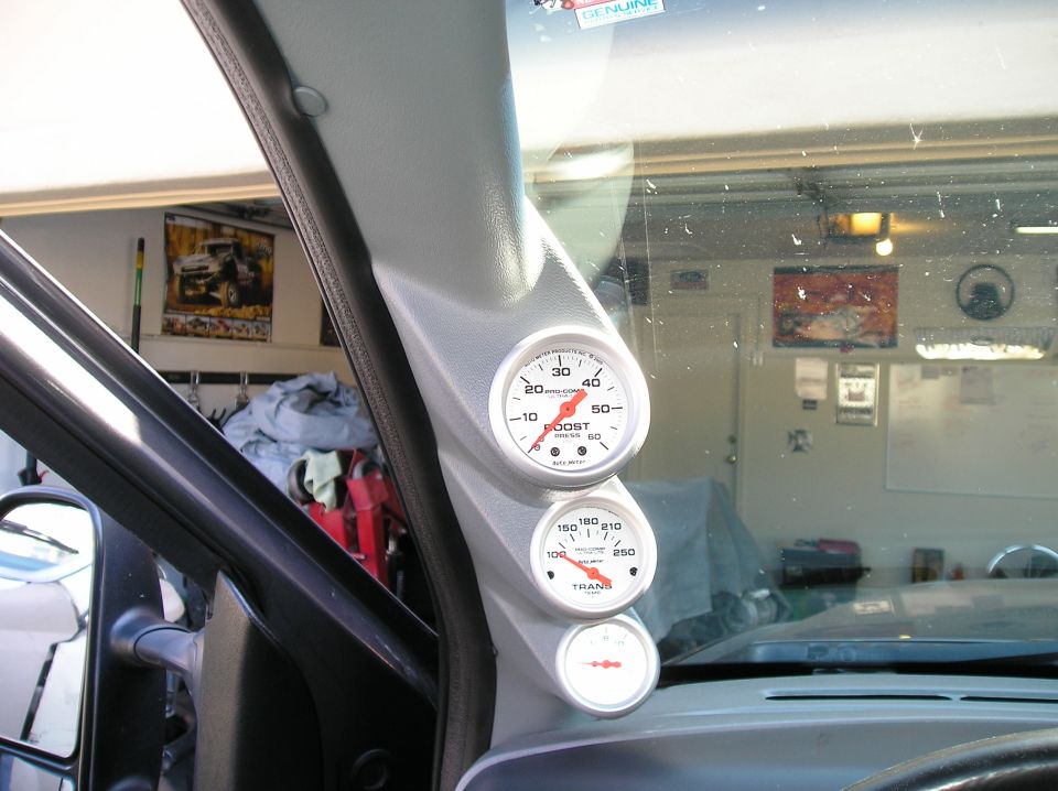 Truck interior with boost and transmission temperature gauges mounted on the A-pillar