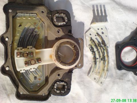 1994 Ford Thunderbird - The internal components of a transmission range sensor are shown, revealing its electrical and mechanical parts.